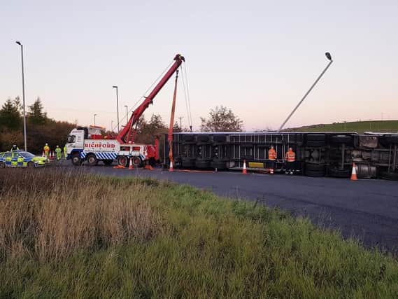 An overturned lorry on the A628 at Flouch island