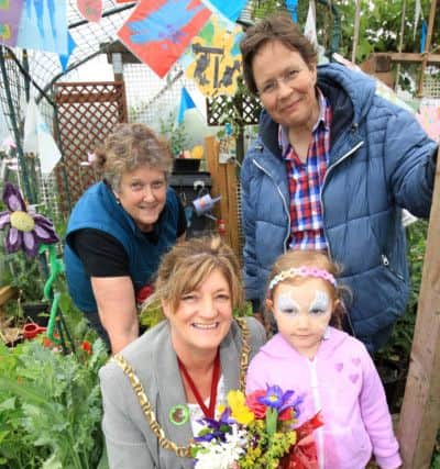 Big Lunch event and annual open day at Firth Park Community Allotments. Pictured are Dot Rodman, Lord Mayor of Sheffield Councillor Denise Fox, Claudia Kuntze, and Isabel Watson, four. Photo: Chris Etchells